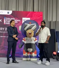 A Beagle Security team member announces the BeSec CTF winners on stage