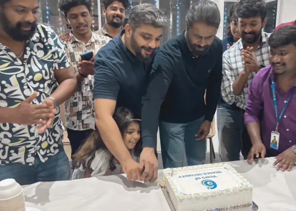 Beagle Security team celebrating the company's 6th anniversary with a cake-cutting ceremony.