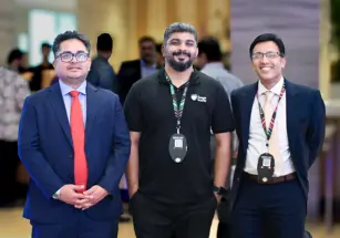 Director Rejah Rehim posing for a photo with new friends at the event.