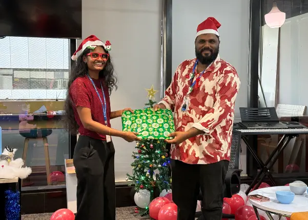 Office Secret Santa gift exchange event