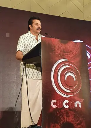The chief guest addressing the crowd at cOcOn XV