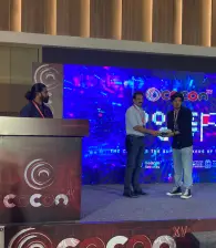 An award being presented to one of the participants of the event.