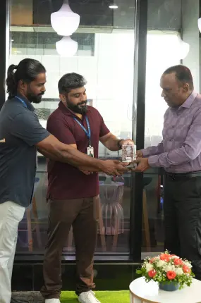 Our founders felicitating the chief guest with a memento.