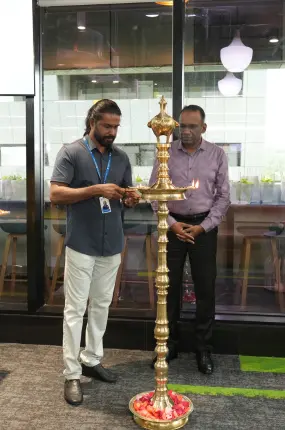 One of our co-founder lighting the lamp during the ceremony.