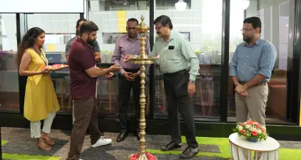 One of our co-founder lighting the lamp during the inauguration ceremony.
