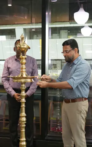 Special guest, Mr. Sreekumar V., Secretary of GTech, lighting the lamp.