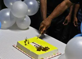 Cutting the foundation day celebratory cake