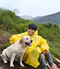 A team member poses with the amazing guide dog at the resort.