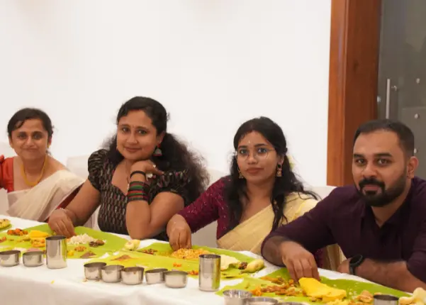 The grand Onam sadhya served on banana leaf.