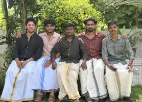 Team members posing for a picture together