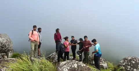 Lost in the serenity of Ponmudi's emerald landscapes during our Seethatheertham trek.