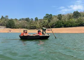 The team enjoying a the ride on the coracle boat at Thenmala ecotourism