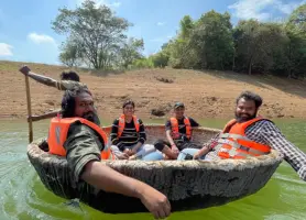 The team enjoying a the ride on the coracle boat at Thenmala ecotourism