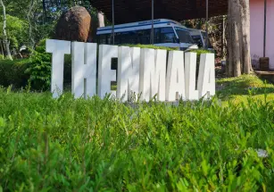 A cutout of the word 'Thenmala' at the entrance to the Thenmala ecotourism office